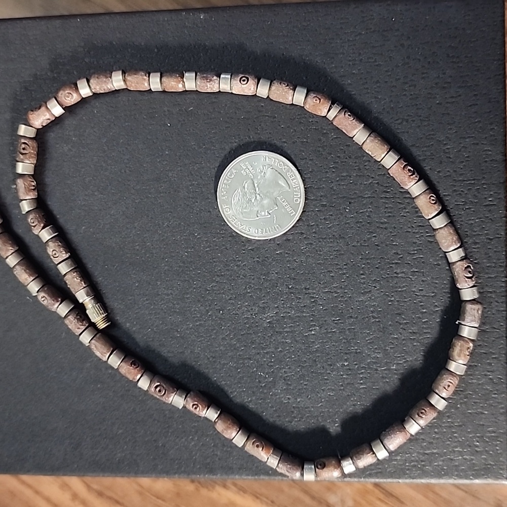 Brown and silver colored necklace. Tribal design. Unisex.